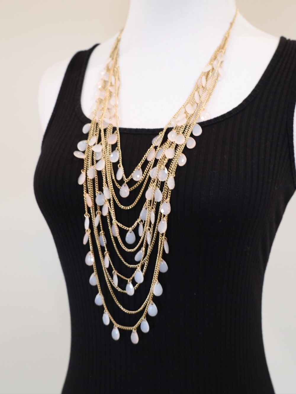 Layered Gold Tone Multi-Strand Necklace with Pale Pink Teardrop Beads